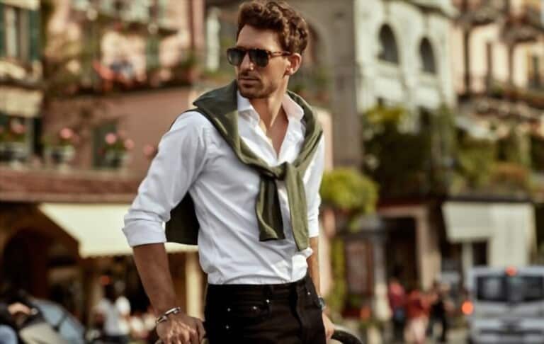 man wearing sunglasses ,white shirt and a rollneck sweater man wearing sunglasses ,white shirt and a rollneck sweater