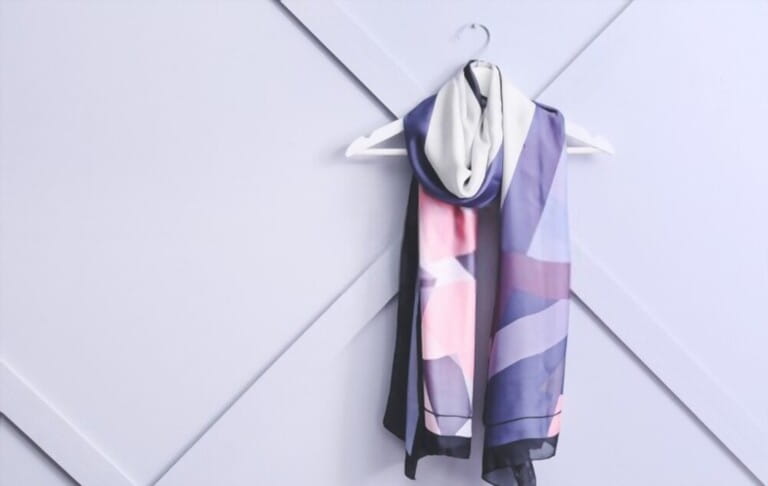 hanger beautiful thin scarf on light background hanger beautiful thin scarf on light background