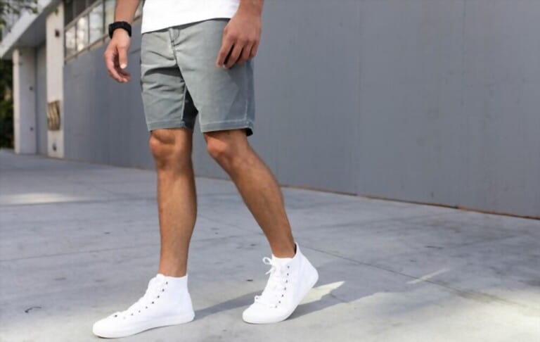 Men's ankle sneakers white street style apparel shoot Men's ankle sneakers white street style apparel shoot