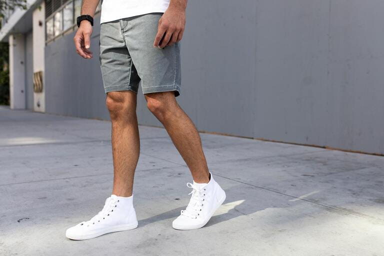 Men's ankle sneakers white street style apparel shoot Men's ankle sneakers white street style apparel shoot