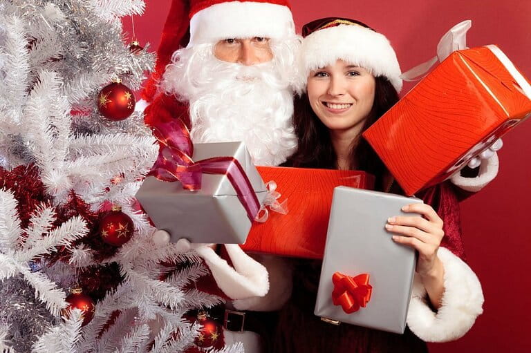 Santa Claus with Christmas tree and gifts Santa Claus with Christmas tree and gifts