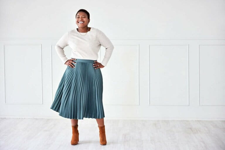 Fashion, happiness and portrait of woman by the wall with fashionable, trendy and office attire. Fashion, happiness and portrait of woman by the wall with fashionable, trendy and office attire.