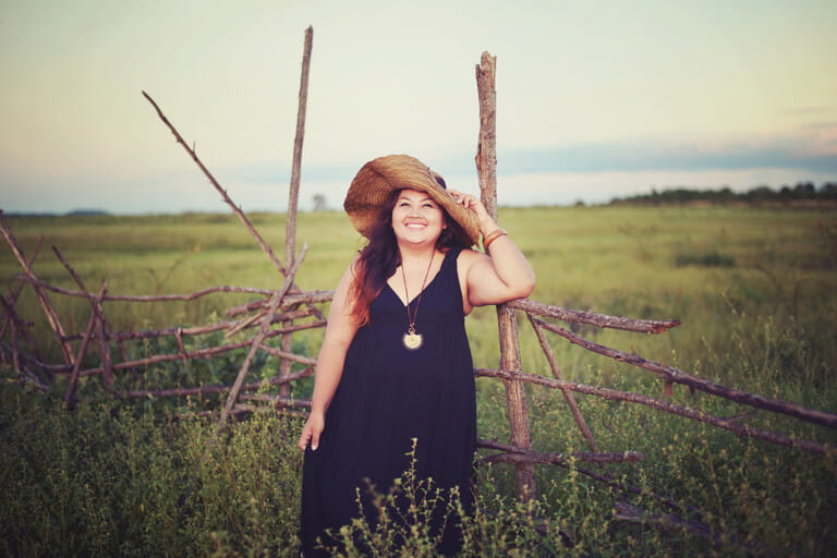 Very happy grown woman in vintage style meadow