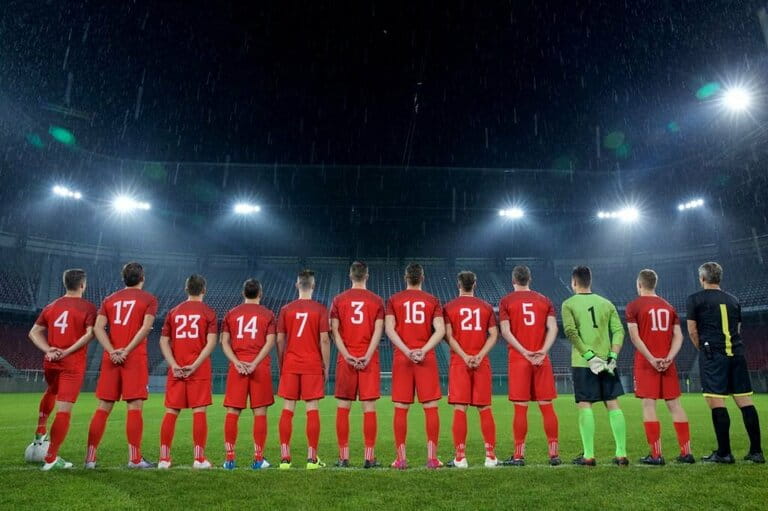 The football team stands in a row The football team stands in a row