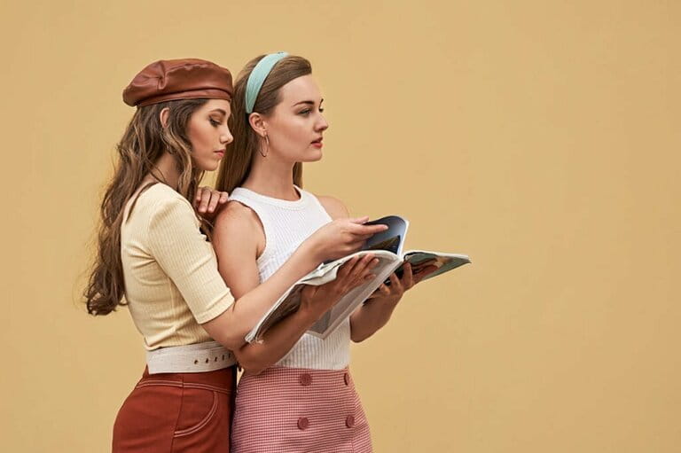 Beautiful young girl dressed in retro vintage style enjoying old European city lifestyle Beautiful young girl dressed in retro vintage style enjoying old European city lifestyle