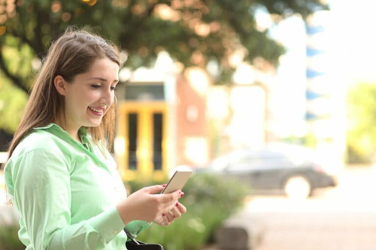 Young adult business woman in downtown city area.