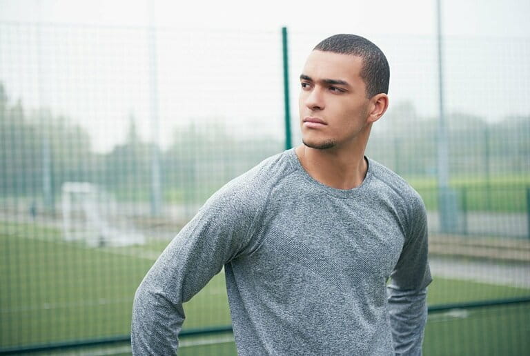 Sports man at playing field Sports man at playing field