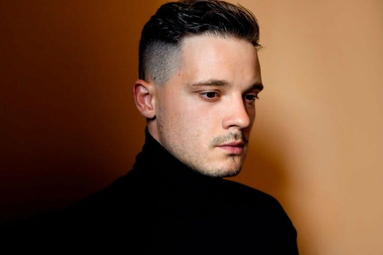 Stylish man with undercut haircut. Indoor portait Stylish man with undercut haircut. Indoor portait