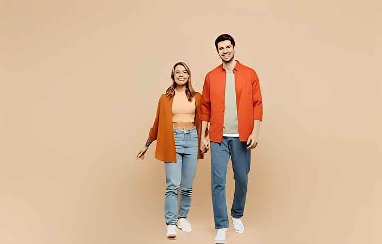 Full body smiling hapy young couple two friends family man woman wear casual clothes walking strolling going hold hands together isolated on pastel plain light beige color background studio portrait Full body smiling hapy young couple two friends family man woman wear casual clothes walking strolling going hold hands together isolated on pastel plain light beige color background studio portrait