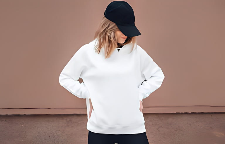 White hoodie on a young woman, mockup. Lifestyle.
