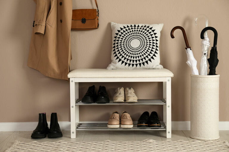Stylish storage bench with different shoes