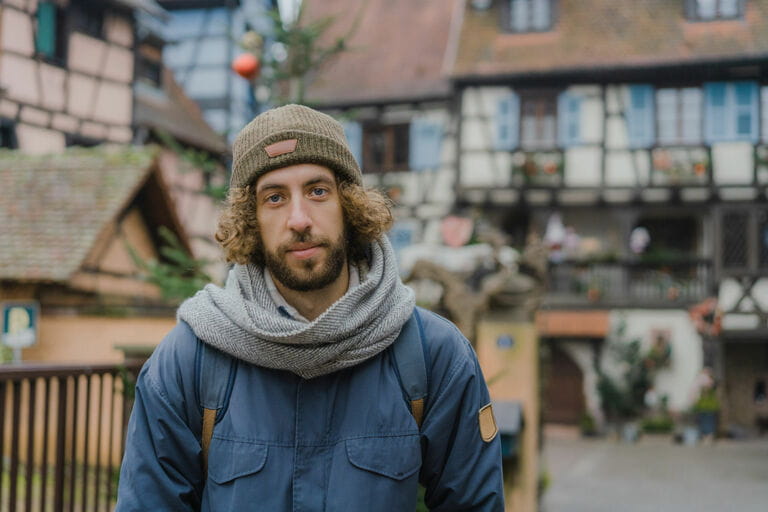 Man walking in the town of Alsace in France