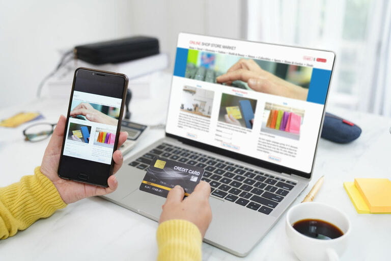 Woman using Smartphone Shopping on E-commerce Shop Website Woman using Smartphone Shopping on E-commerce Shop Website