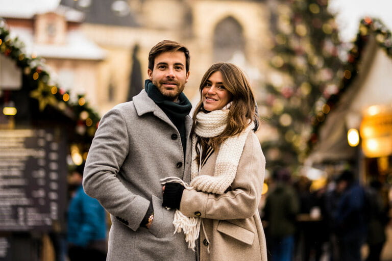 Happy young couple enjoying a Christmas day together in the city