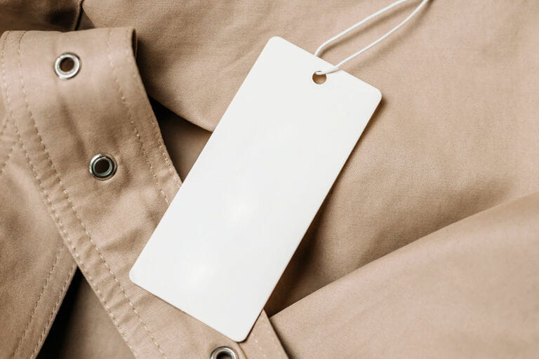 Khan and Tag on beige raincoat fabric. mockup for close-up design Khan and Tag on beige raincoat fabric. mockup for close-up design