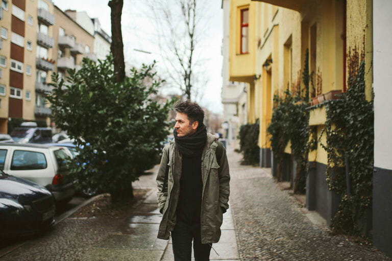 Young man walking in Berlin