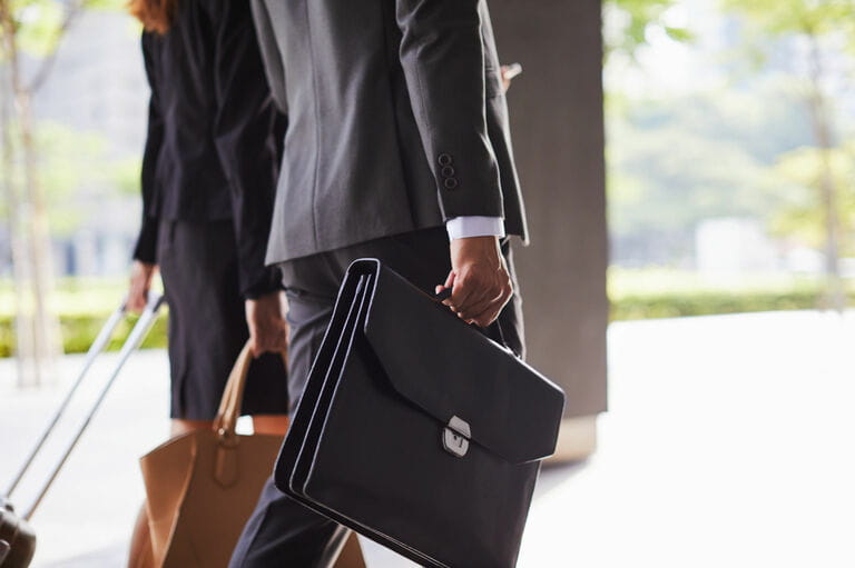 Business trip details of briefcases and suitcases